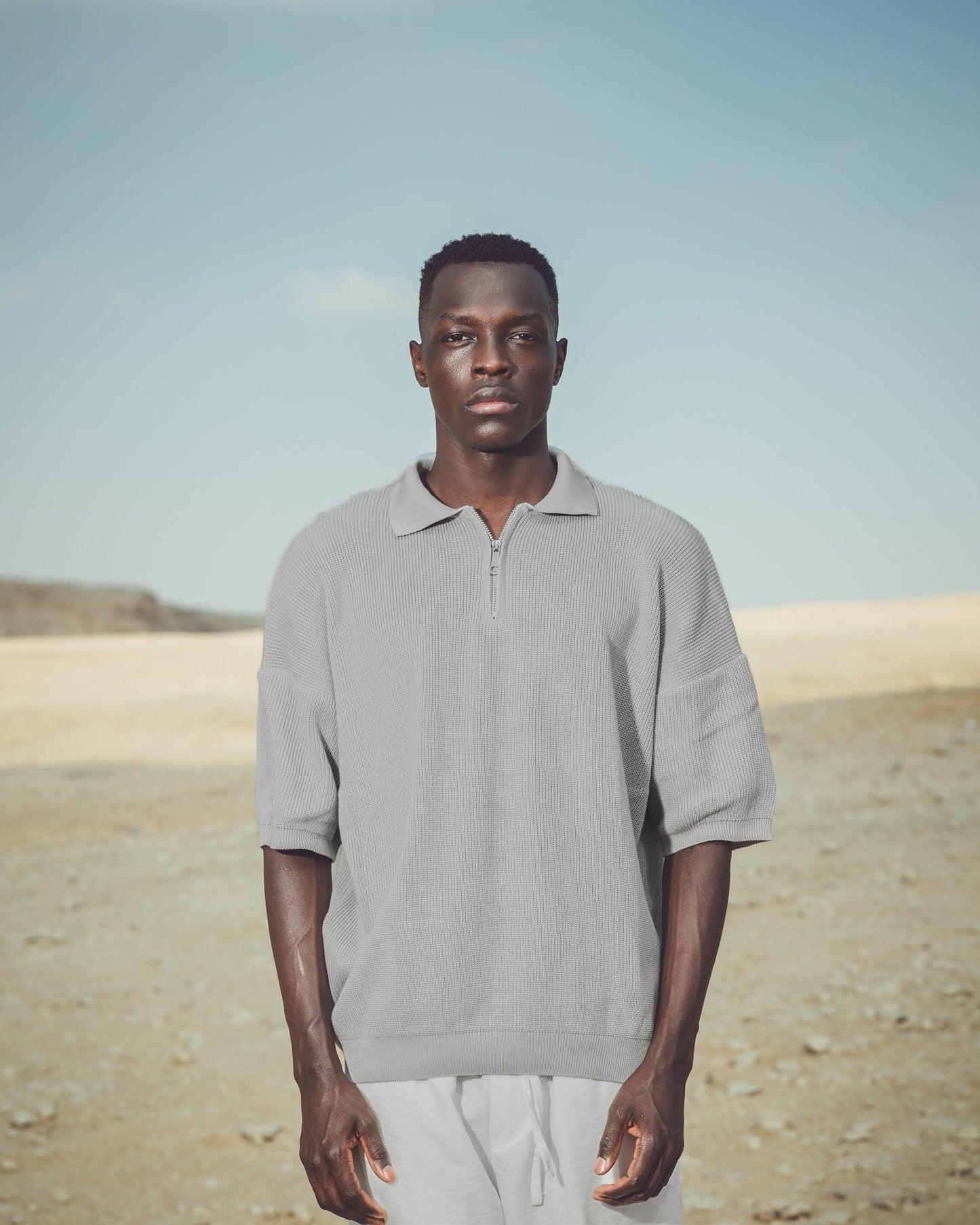 Oversized fit knit quarter zip polo shirt