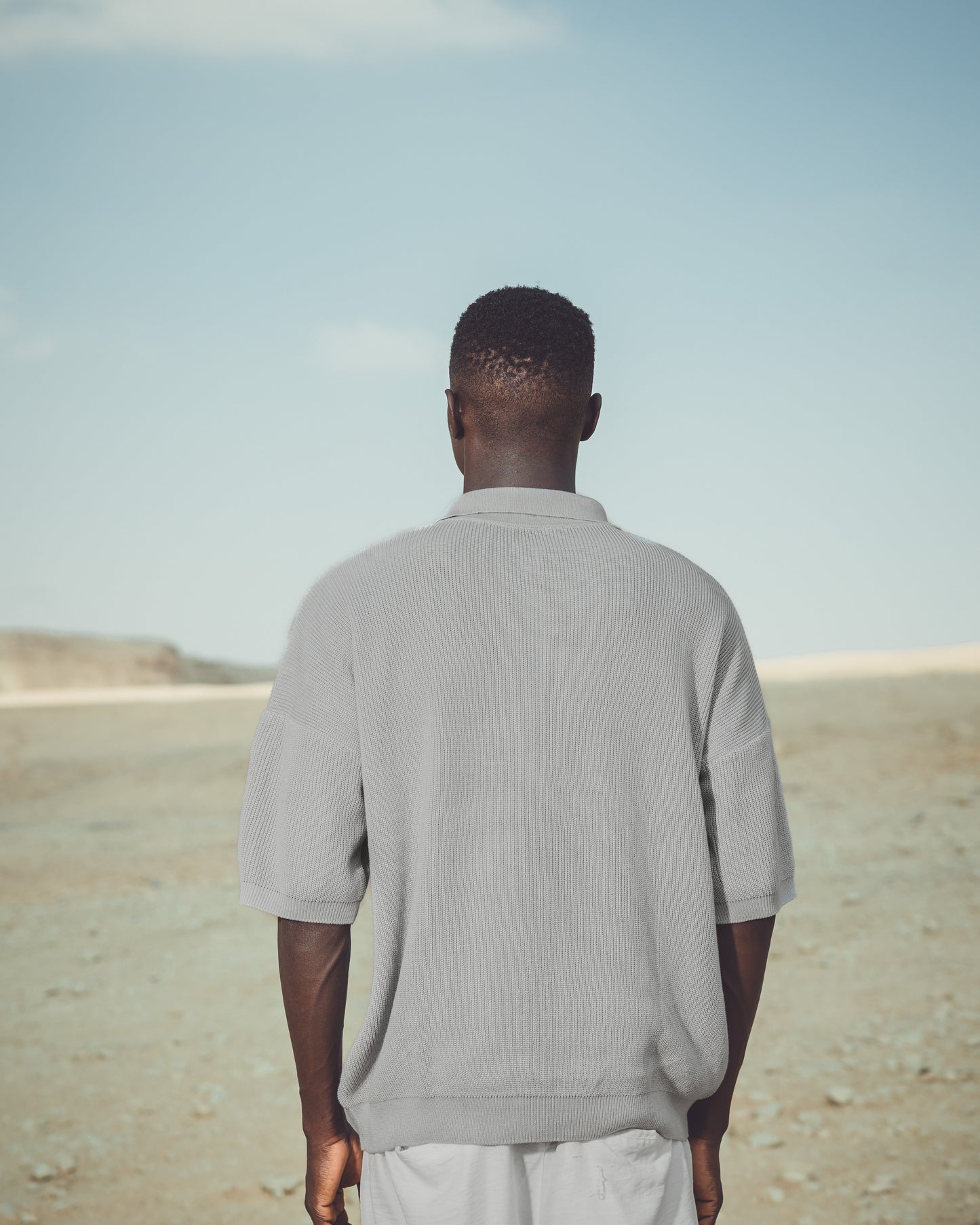 Oversized fit knit quarter zip polo shirt